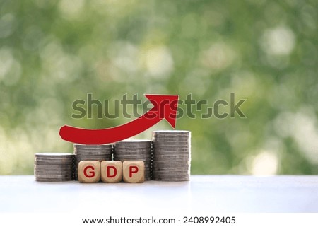
Red arrow on coins money and gdp word on natural green background, GDP (Gross Domestic Product) concept