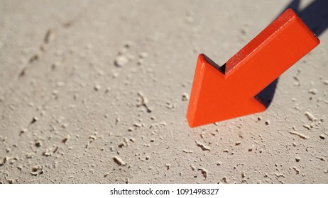 A RED ARROW ON A WITHE TABLE IN PERSPECTIVE VIEW