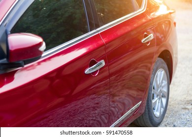 Red auto window or automobile motor car of shiny convertible luxury outside background,transportation trip concept