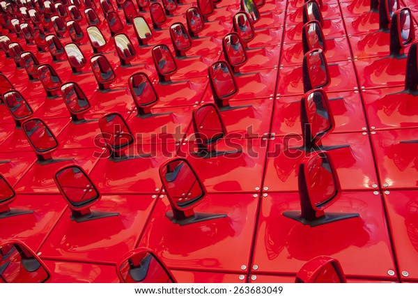 red\
background in the form of automobile\
mirrors