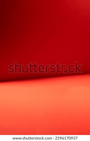  red background with smooth gradients and subtle lighting variations. The minimalistic design and vibrant tones create a visually captivating effect, ideal for artistic and modern design applications.