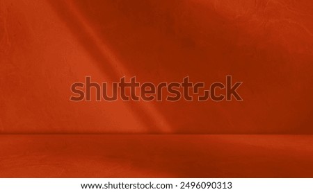 red background studio room with light beam from above for product display especially cosmetic or beauty products. floor and wall backdrop muslin design backdrop. stone surface texture podium.