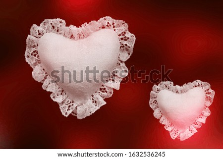 Red background with white textile hearts
