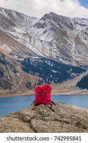 red backpack in the mountains