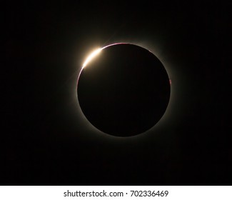 Red baileys beads peek out during Eclipse 2017 - Powered by Shutterstock