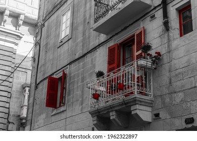 Red Balcony With Flowers In Old Hause In Malta