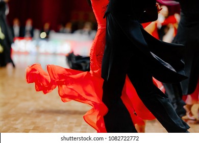 red ball gown and black tailcoat couples dancers ballroom dancing