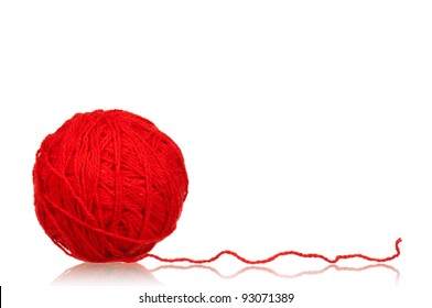Red ball of yarn for knitting isolated on white background
