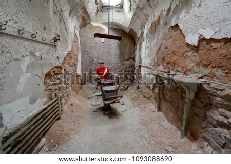 Red Barber Chair in an Abandoned Prison