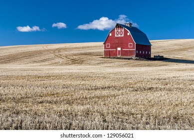 Red Barn Against A Blue Sky