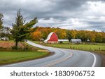 Red Barn by the scenic byway 119 near Harbor springs in Michigan