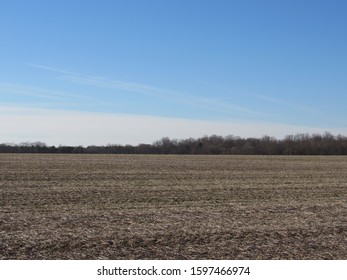 Red barn and farming fields