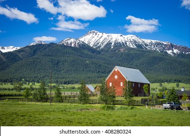 Red Barn Near Wallowa Mountains In Oregon