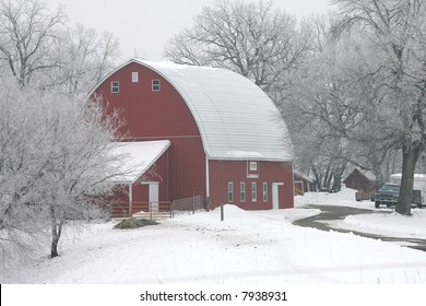 Red Barn On A Foggy Winter Morning