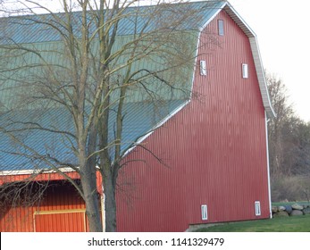 red barn and tree