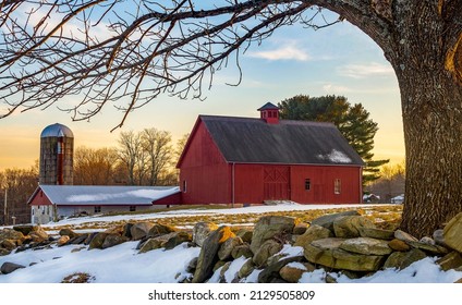 Red barn in winter sunset - Powered by Shutterstock