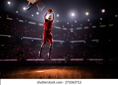 Red Basketball Player In Action In Gym