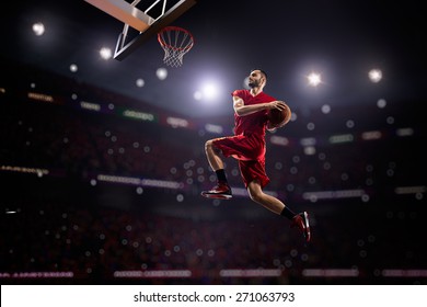 red Basketball player in action in gym - Shutterstock ID 271063793