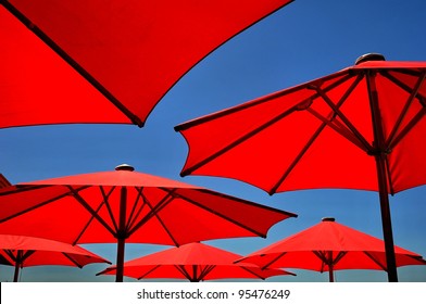 Red Beach Umbrella With Blue Sky