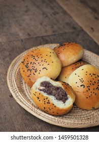 Red Bean Buns In Basket On Wooden Table