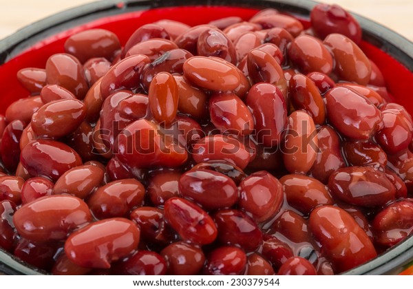 Red beans from can with\
leaf