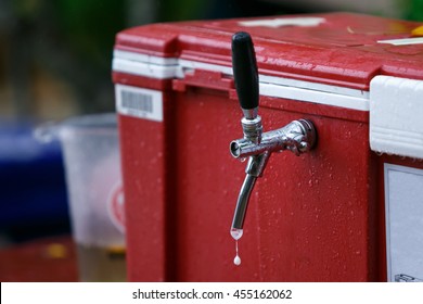 Red Beer Cooler Box Leaking At Tap.