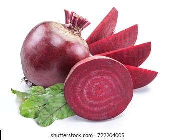 Red beet or beetroot with beet leaves on white background.