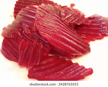 red beetroot slices with white background. healthy and vegetarian food