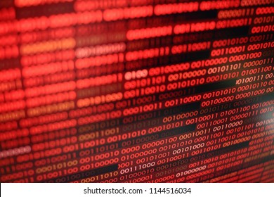 red binary code. computer technology background. red binary code computer language data transfers. unsecured and dangerous big data and ai artificial intelligence cyber network.