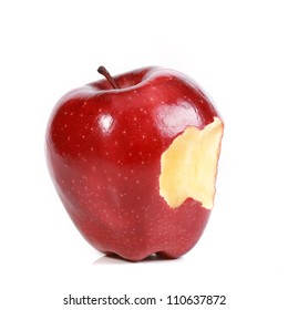 Red bitten apple on white background.