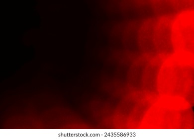Red and black abstract up close blurred dots lightburst pattern