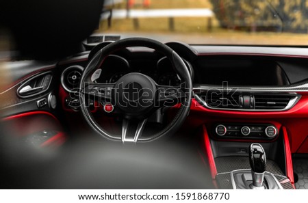 red and black interior of a Alfa Romeo stevilo SUV
