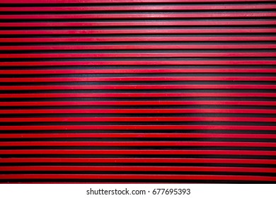 Red with black texture pattern abstract background can be use as wall paper screen saver brochure cover page or for presentation background also have copy space for text.