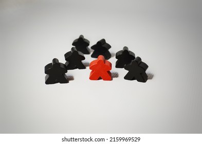 Red And Black Toy People, Leader And Lonely Person Concept