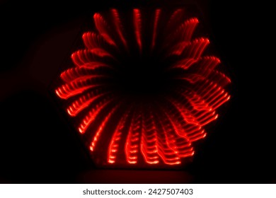 Red and black twisty abstract dot lightburst geometric pattern