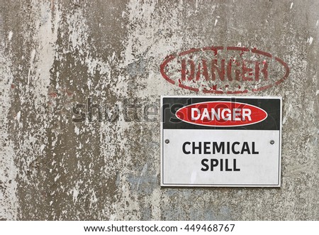 red, black and white Danger, Chemical Spill warning sign
