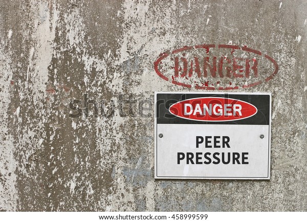 red,\
black and white Danger, Peer Pressure warning\
sign