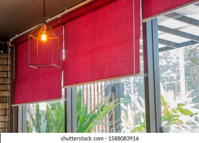 Red Blinds, Roller, Curtain, Roll, Shades, Shutters With Suspended Ceiling Lamp.