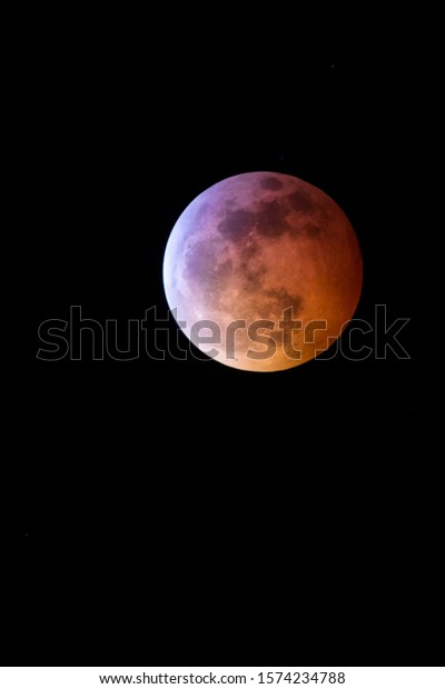 The red blood moon during the total lunar eclipse at\
the beginning of 2019