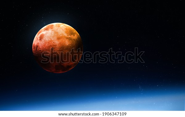 Red bloody Moon. Super Moon\
in the sky. Vire from space. Elements of this image furnished by\
NASA.