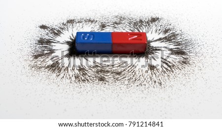 Red and blue bar magnet or physics magnetic with iron powder magnetic field on white background. Scientific experiment in science class in school.