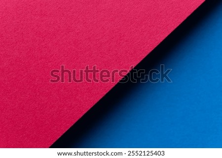 Red and blue construction paper overlapping