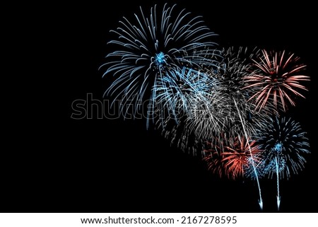 Red and Blue Firework in black background
