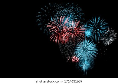 Red And Blue Fireworks On Black Background