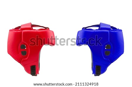 red and blue leather boxing helmet close-up. is isolated on a white background. head protection. sports equipment. confrontation