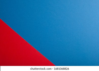 Red and blue paper background, texture, copy space.