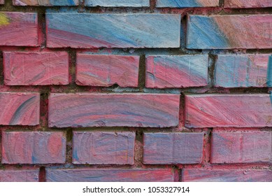 Red blue stone texture bricks in the wall the house
