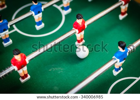 Similar – Image, Stock Photo Metal old foosball table with yellow and blue figurines