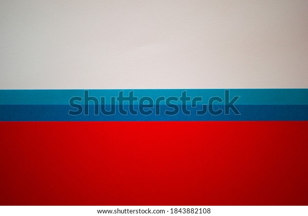 Red, blue\
and white horizontally divided\
background