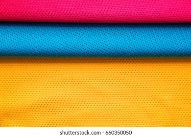 Red, Blue And Yellow Jersey Fabric Texture Background, Sports Wear.